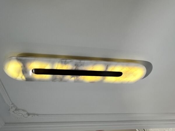 Elips Lazerli Mermer Aplik – Doğal Mermer ve Hassas Lazer Detaylarıyla Lüks Duvar Aydınlatması