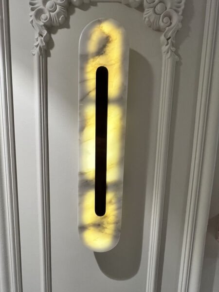 Elips Lazerli Mermer Aplik – Doğal Mermer ve Hassas Lazer Detaylarıyla Lüks Duvar Aydınlatması